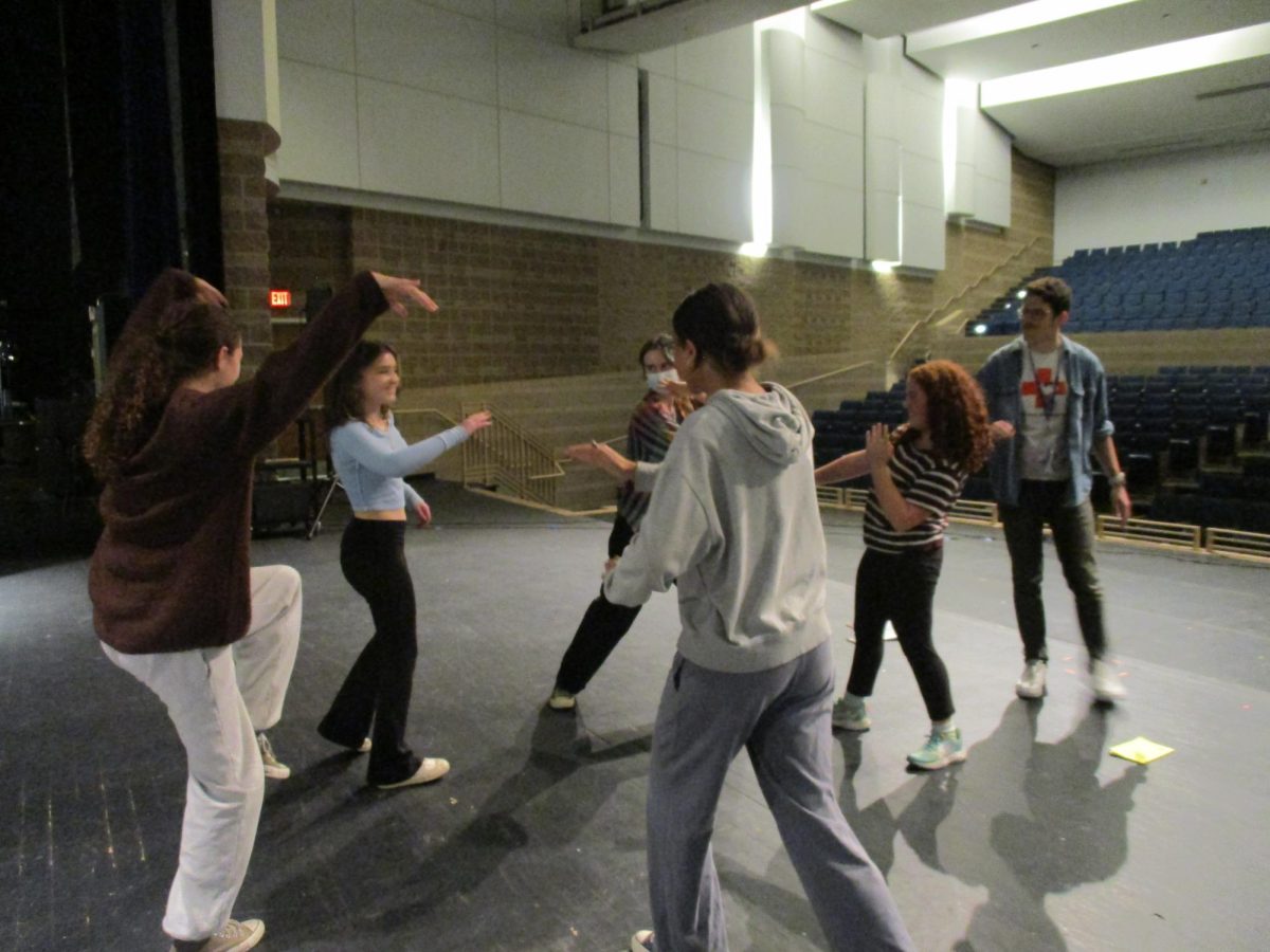 Mr. Verga in action with his actors while rehearsing for the upcoming play The Brothers Grimm Spectaculathon.

