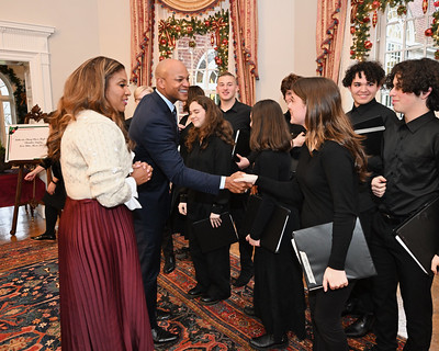 Senior Abigail Geyer shakes hands with Maryland Governor, Wes Moore, while visiting the State House as a member of B-CCs Chamber Singers.