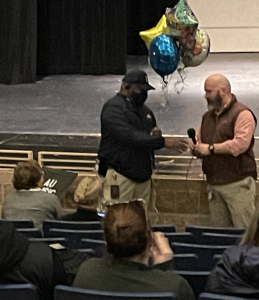 Mr. Gray being honored as one of the five finalists for MCPS Employee of the Year in the category of supporting services by Dr. Mooney. 