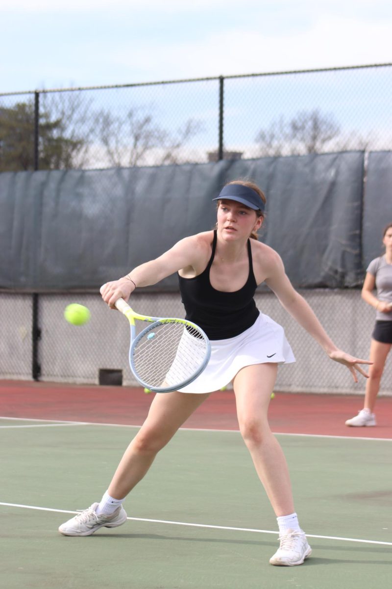 Sophomore Abby Meers hits a winner during Girls Varsity Tennis practice