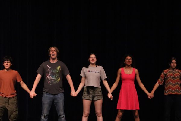 The cast of The Prom sings Intolerance Song during a rehearsal before the show.