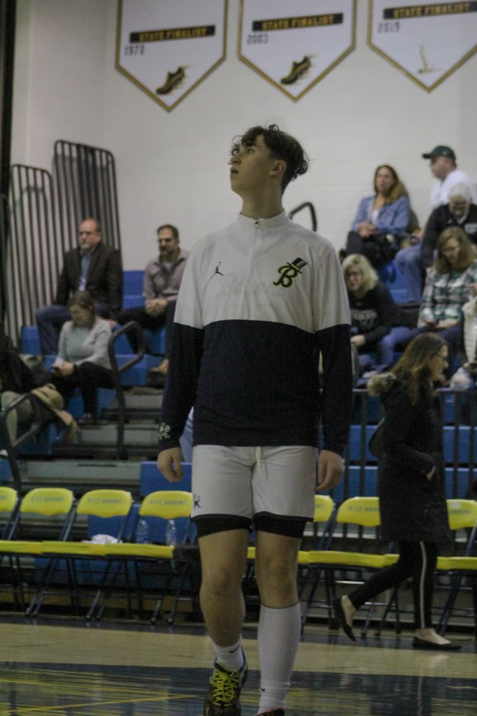 Senior Liam Karver warming up for a game last season 