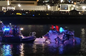 Emergency units respond after a passenger aircraft collided with a helicopter and crashed into the Potomac River last night. 
