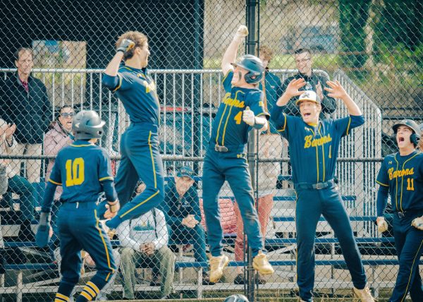 The Barons celebrate an Alex Butler home run.