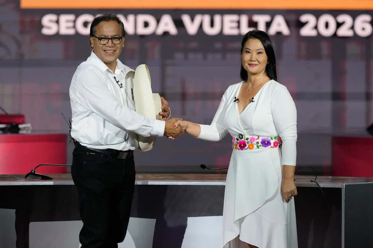 Peruvian presidential candidates Roberto Sanchez and Keiko Fujimori at a debate prior to the election. (Image courtesy of The Washington Post)